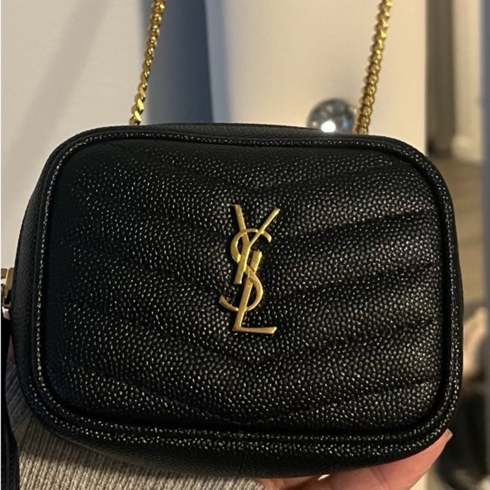 Yves Saint Laurent leather crossbody bag, silver hardware, and chevron pattern